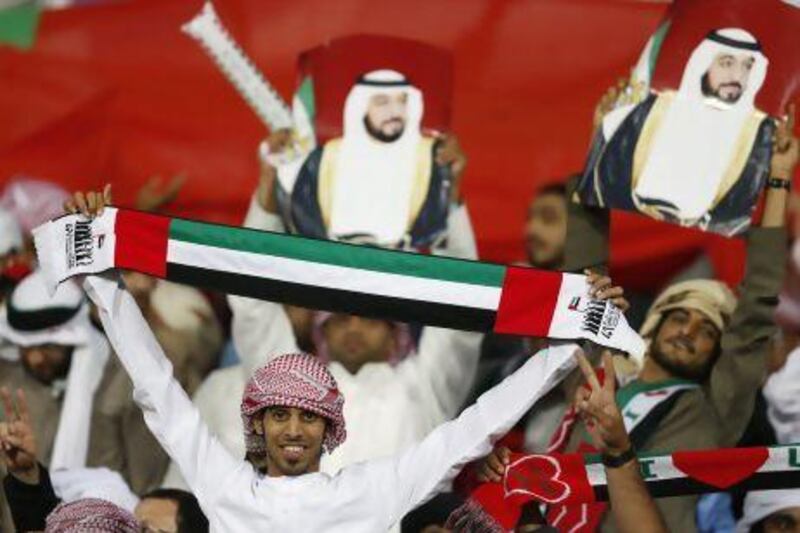 UAE's fans cheer for their team during the Gulf Cup final against Iraq.