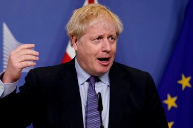 British Prime Minister Boris Johnson addresses a joint press conference with the European Commission president at a European Union summit in Brussels on October 17, 2019. AFP