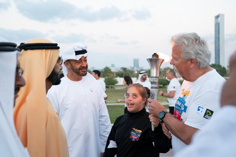 ABU DHABI, UNITED ARAB EMIRATES - March 10, 2019: HH Sheikh Mohamed bin Zayed Al Nahyan, Crown Prince of Abu Dhabi and Deputy Supreme Commander of the UAE Armed Forces (3rd L) and HH Sheikh Mohamed bin Rashid Al Maktoum, Vice-President, Prime Minister of the UAE, Ruler of Dubai and Minister of Defence (2nd L), speak with the Special Olympics athlete, during the Determination Retreat at the Presidential Palace.

( Ryan Carter for the Ministry of Presidential Affairs)
---