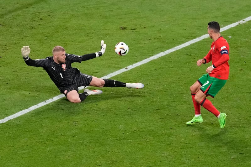 Came out smartly to make a fantastic one-handed save to deny Ronaldo. Another good save from Ronaldo just before half time. Equal to everything until his terrible blunder to palm the ball against Hranac to cause the own goal for Portugal's equaliser. Should have caught the ball, despite the wet conditions. AP 
