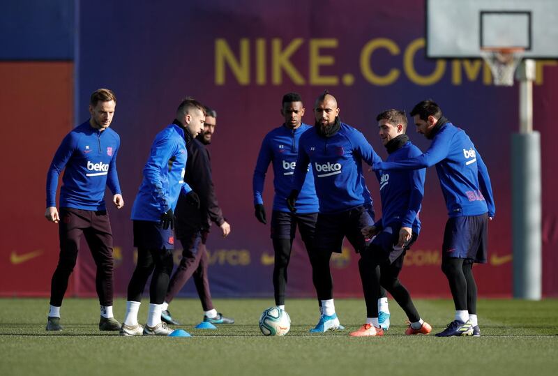 Barcelona's Ivan Rakitic, Jordi Alba, Nelson Semedo, Arturo Vidal and Lionel Messi take part in a training session. Reuters