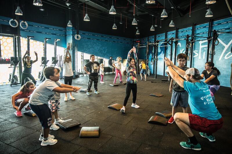 Children participate in the CrossFit Kids class at Vogue Fitness - Crossfit Yas. Courtesy Vogue Fitness - Crossfit Yas
