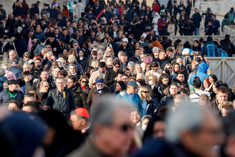 Mourners queue in St Peter's Square. Reuters