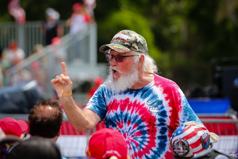 A Maga supporter speaks during a rally. Getty Images / AFP
