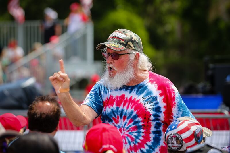 A Maga supporter speaks during a rally. Getty Images / AFP
