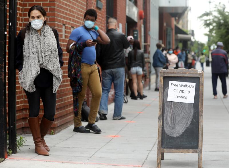 People keep a social distance in Washington. Reuters