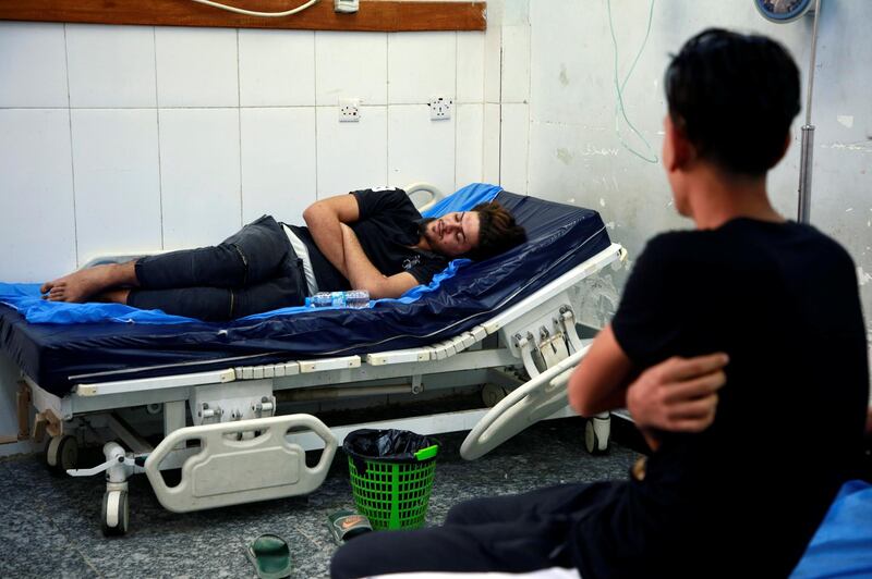 Ahmed Malik, 32, lies inside a hospital after being poisoned by water pollution in Basra, Iraq September 13, 2018. Basra residents say salt seeping into the water supply has made it undrinkable and sent hundreds to a hospital. Picture taken September 13, 2018.  REUTERS/Alaa al-Marjani