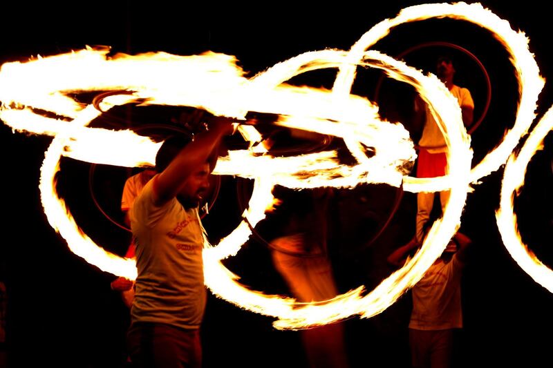 Sri Lankan dancers with flaming torches perform during the Duruthu Maha Peherahera or Buddhist religious procession at the Kelaniya Rajamaha Viharaya at Kelaniya in Colombo, Sri Lanka. EPA