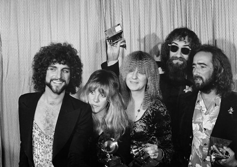 Fleetwood Mac pose with their Album of the Year Grammy Award for Rumours in Los Angeles, 1978. AP