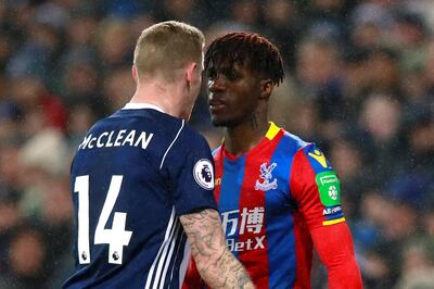 Soccer Football - Premier League - West Bromwich Albion vs Crystal Palace - The Hawthorns, West Bromwich, Britain - December 2, 2017   Crystal Palace's Wilfried Zaha clashes with West Bromwich Albion's James McClean    Action Images via Reuters/Jason Cairnduff    EDITORIAL USE ONLY. No use with unauthorized audio, video, data, fixture lists, club/league logos or "live" services. Online in-match use limited to 75 images, no video emulation. No use in betting, games or single club/league/player publications. Please contact your account representative for further details.
