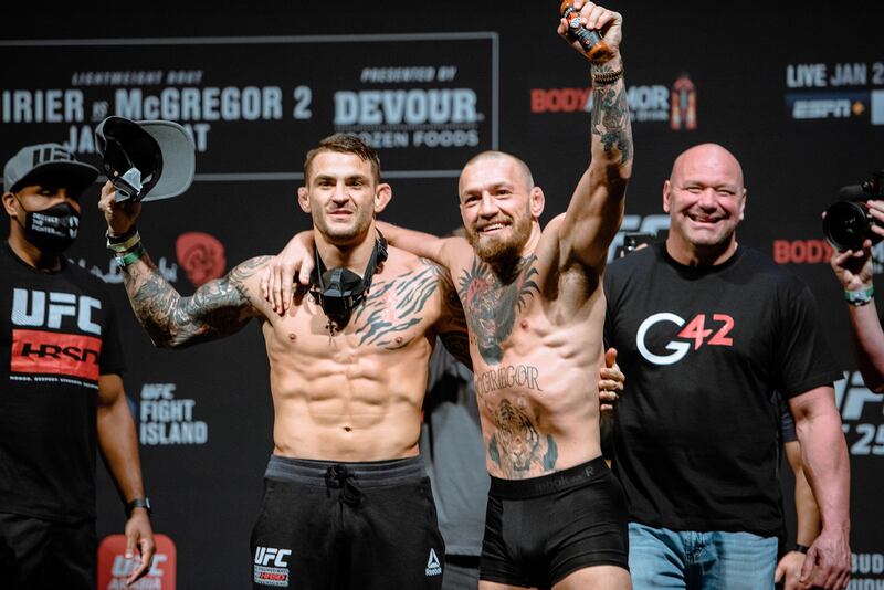 Conor McGregor and Dustin Poirier both successfully made weight on Friday ahead of their UFC 257 main event. Getty Images