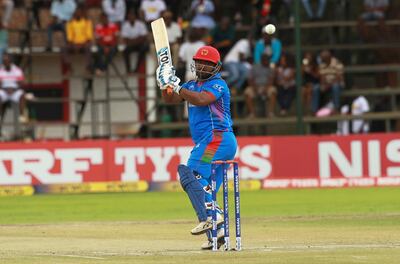 Afghanistan batsman Mohammad Shahzad in action during the cricket world cup qualifier match against West Indies at Harare Sports Club, Sunday March 25, 2018. Zimbabwe is playing host to the 2018 Cricket World Cup qualifier matches. (AP Photo/Tsvangirayi Mukwazhi)