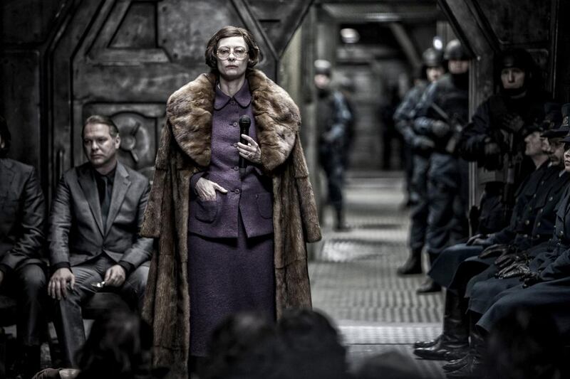 Tilda Swinton, centre, in a scene from the film Snowpiercer. Courtesy Moho Films