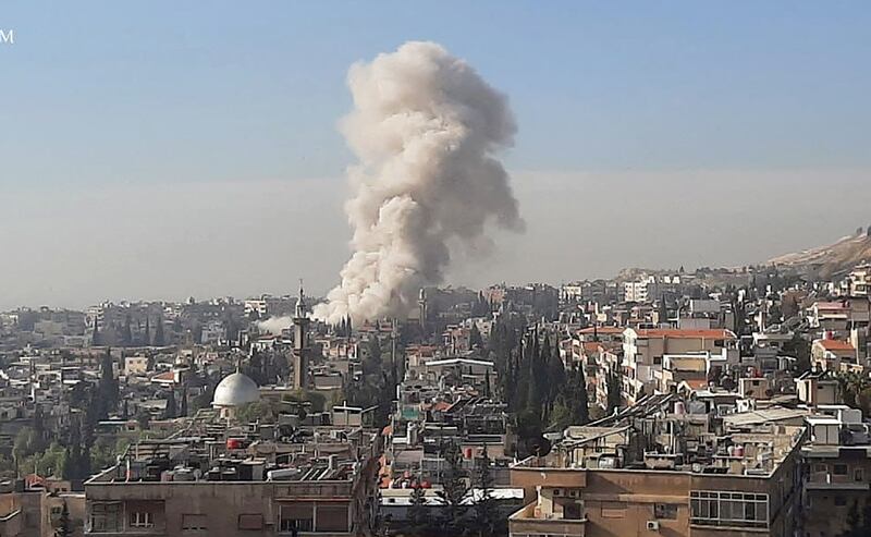 Smoke rises after an Israeli missile strike on Damascus on January 20. Reuters