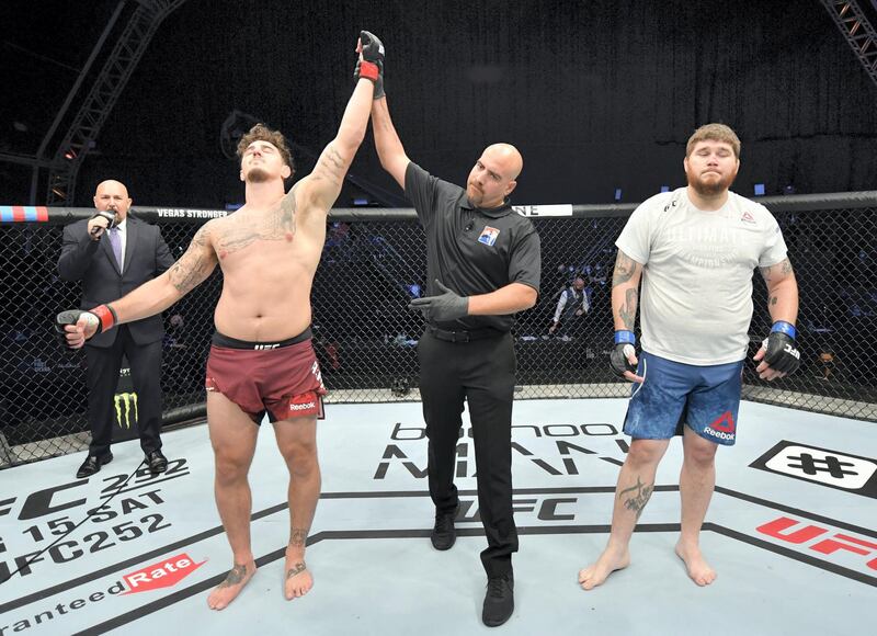 ABU DHABI, UNITED ARAB EMIRATES - JULY 26: Tom Aspinall of England celebrates after his victory over Jake Collier in their heavyweight fight during the UFC Fight Night event inside Flash Forum on UFC Fight Island on July 26, 2020 in Yas Island, Abu Dhabi, United Arab Emirates. (Photo by Jeff Bottari/Zuffa LLC via Getty Images) *** Local Caption *** ABU DHABI, UNITED ARAB EMIRATES - JULY 26: Tom Aspinall of England celebrates after his victory over Jake Collier in their heavyweight fight during the UFC Fight Night event inside Flash Forum on UFC Fight Island on July 26, 2020 in Yas Island, Abu Dhabi, United Arab Emirates. (Photo by Jeff Bottari/Zuffa LLC via Getty Images)