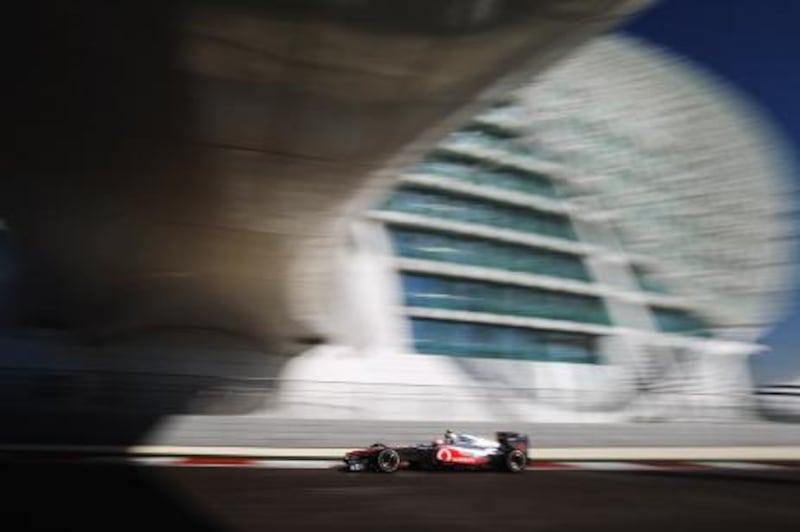 ABU DHABI, UNITED ARAB EMIRATES - NOVEMBER 11:  Jenson Button of Great Britain and McLaren drives during practice for the Abu Dhabi Formula One Grand Prix at the Yas Marina Circuit on November 11, 2011 in Abu Dhabi, United Arab Emirates.  (Photo by Mark Thompson/Getty Images) *** Local Caption ***  132204172.jpg