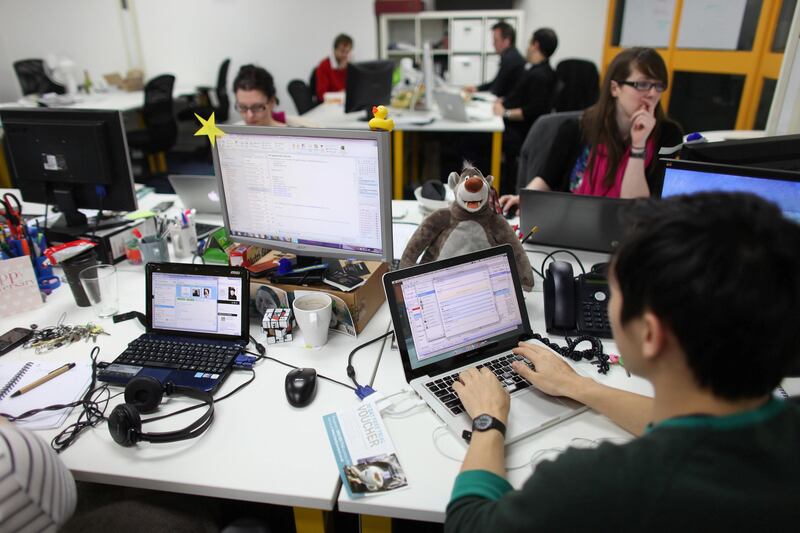 LONDON, ENGLAND - MARCH 15:  People work at computers in TechHub, an office space for technology start-up entrepreneurs, near the Old Street roundabout in Shoreditch which has been dubbed 'Silicon Roundabout' due to the number of technology companies operating from the area on March 15, 2011 in London, England. Entrepreneurs using TechHub are predominantly product-oriented tech companies who rent desk space and use the fast wifi. The relatively low rental rates and proximity to media and internet companies has made the area close to the roundabout a prime location for IT firms and web entrepreneurs.  (Photo by Oli Scarff/Getty Images)