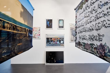 Augustine Paredes's photographic installation 'Am I Driving Safely? Please Call', which documents the lives of delivery truck drivers through their vehicles. Courtesy Warehouse421