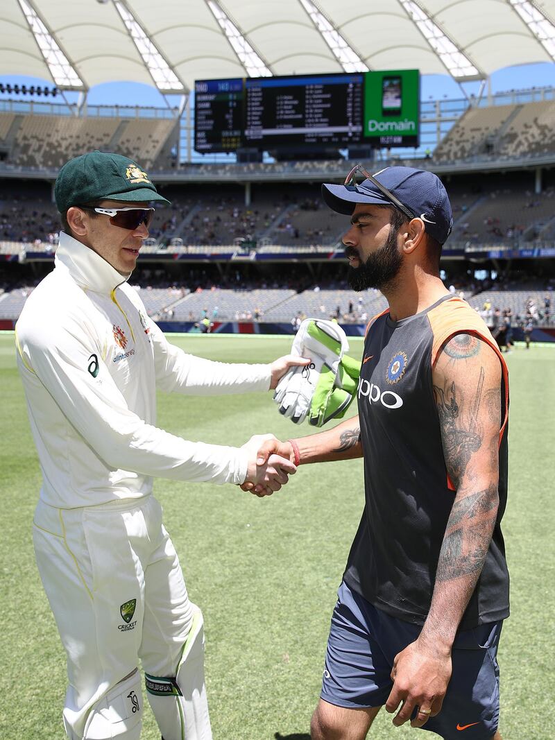 PERTH, AUSTRALIA - DECEMBER 18: Tim Paine of Australia shakes hands with Virat Kohli of India after Australia claimed victory during day five of the second match in the Test series between Australia and India at Perth Stadium on December 18, 2018 in Perth, Australia. (Photo by Ryan Pierse/Getty Images)