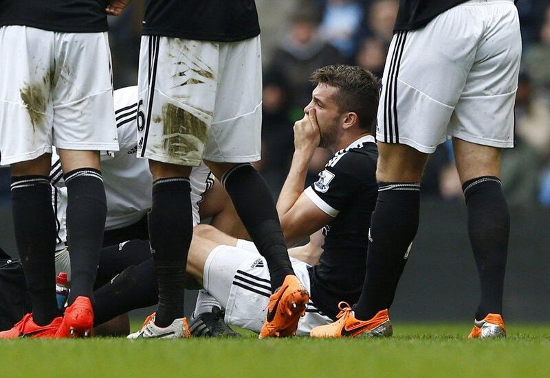 Southampton's Jay Rodriguez reacts after after sustaining an injury during against Manchester City on Saturday. Darren Staples / Reuters / April 5, 2014