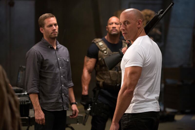 Walker, Dwayne Johnson and Diesel in Furious 6