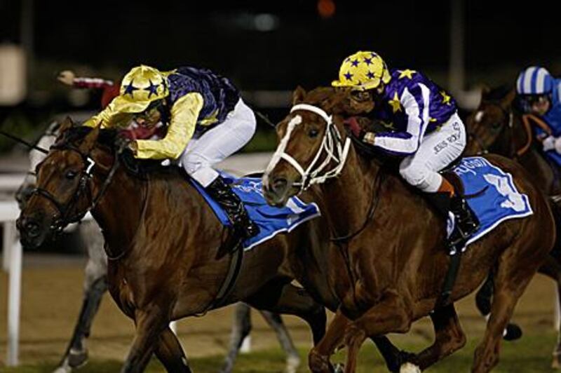 Jesus Rosales rides Samira De Carrere, right, to victory from Sahib Du Clos in the Meydan Horizons Abu Dhabi Championship.