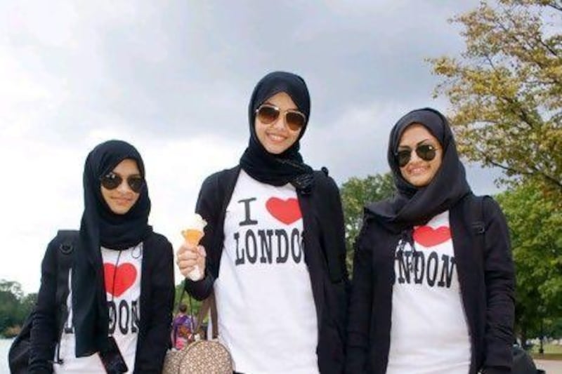 16-year-old Salma Mohammed, centre, is one Saudi Arabian who likes to visit the Serpentine lake in Hyde Park.