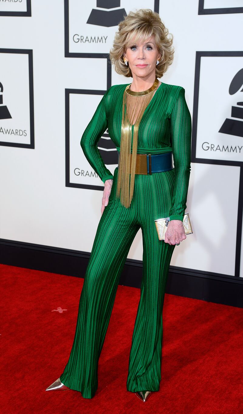 Jane Fonda, in a green Balmain jumpsuit, arrives for the 57th annual Grammy Awards at the Staples Centre in Los Angeles, California, on February 8, 2015