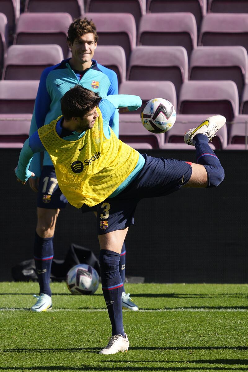 Gerard Pique trains for Saturday's match against Almeria. EPA