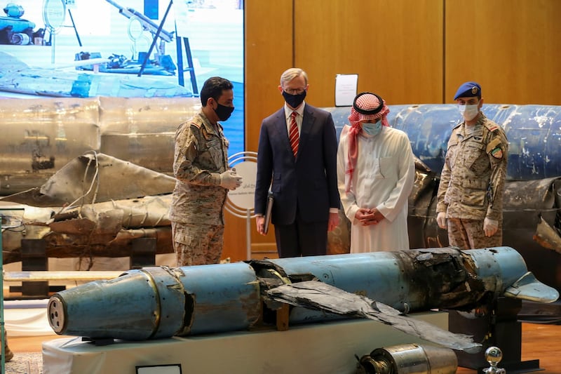 Saudi Arabia's Minister of State for Foreign Affairs Adel Al Jubeir and US Special Representative for Iran Brian Hook, check the display of the debris of ballistic missiles and weapons which were launched towards Riyadh, according to Saudi Officials, in Riyadh, Saudi Arabia June 29, 2020. Reuters