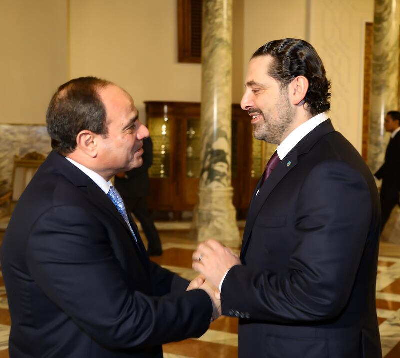 epa06342589 A handout photo made available by Lebanese official photography agency Dalati Nohra shows Egyptian President Abdel Fattah al-Sisi (L) greeting resigned Lebanese Prime Minister Saad Hariri in the Egyptian Presidential Palace, Cairo, Egypt, 21 November 2017. Hariri visited Egypt to meet with President al-Sisi to discuss the current political situation in Lebanon and the whole area before returning back to Beirut, after 18 days from his resignation from the post of Prime Minister during a visit to Saudi Arabia, a move that the media reports as a part of the Saudi-Irani proxy conflict.  EPA/DALATI NOHRA HANDOUT  HANDOUT EDITORIAL USE ONLY/NO SALES
