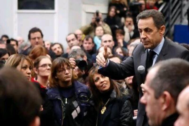 Nicolas Sarkozy delivers a speech to workers at the French solar panel maker PhotoWatt in Bourgoin-Jallieu, France, on Tuesday. The French president is seeking a second term in elections starting on April 22.