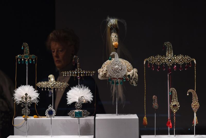 (FILES) This file photo taken on October 27, 2014 shows jeweled objects on display during a press preview of an exhibition titled "Treasures from India, Jewels from the Al-Thani collection" at the Metropolitan Museum of Art in New York. 
Thieves made off with several items of Indian maharajahs' treasures owned by a member of the Qatari royal family after an audacious heist on January 3, 2017 at the Doge's palace in Venice, police said. Italian authorities investigating the theft put at around a million euros (USD 1.2 million) the overall value of the collection of Treasures of the Mughals and the Maharajahs on display. / AFP PHOTO / JEWEL SAMAD