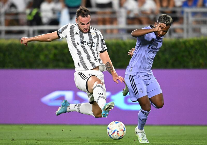 Juventus defender Frederico Gatti and Real Madrid forward Rodrygo compete for the ball. AFP