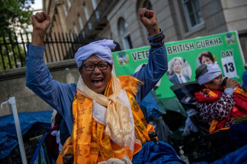Veteran British Ghurka, Dhan Gurung, 60, celebrates opposite Downing Street after ending his hunger strike on August 19, 2021 in London, England. Getty Images