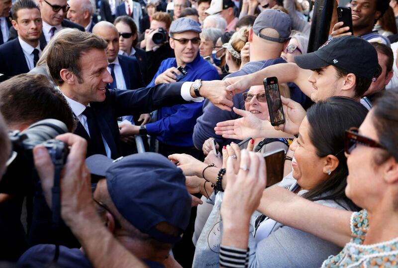 Mr Macron was mobbed by well-wishers on the streets of New Orleans. AFP