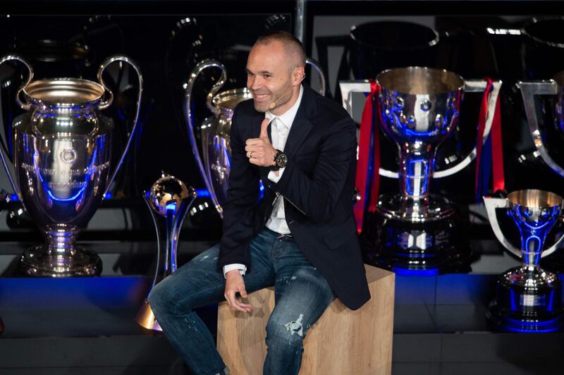 Barcelona's Spanish midfielder and captain Andres Iniesta gives a thumbs-up during a tribute at the Camp Nou stadium in Barcelona on May 18, 2018.   Iniesta says he will decide "next week" whether to continue his decorated career in either China or Japan. The 34-year-old Barca icon is bringing the curtain down on his two-decade stay with the Spanish champions, with his last game for the club he joined at the age of 12 coming on May 20, 2018.
 / AFP / Josep LAGO
