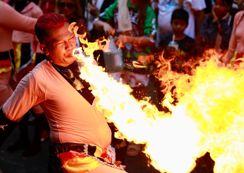 A Filipino dancer performs with fire to mark the Chinese Lunar New Year in Manila, Philippines. EPA