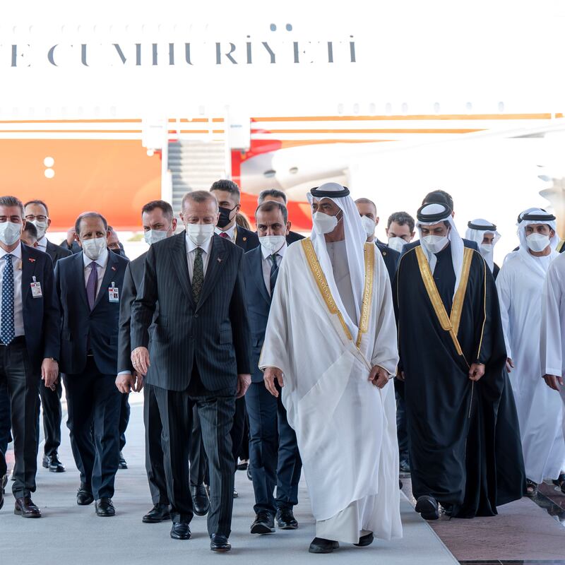 Sheikh Mohamed receives Mr Erdogan on his arrival at the Presidential Airport.