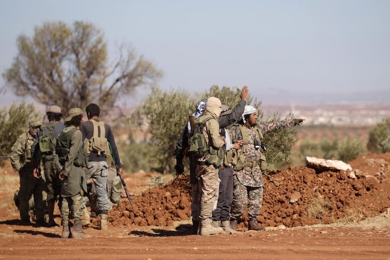 Rebel fighters gather during their advance towards the ISIL-held city of Al Bab, northern Syria on October 26, 2016. Khalil Ashawi/Reuters