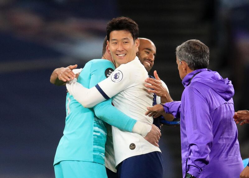 Hugo Lloris celebrates with Son Heung-min and Lucas Moura after the match. Reuters