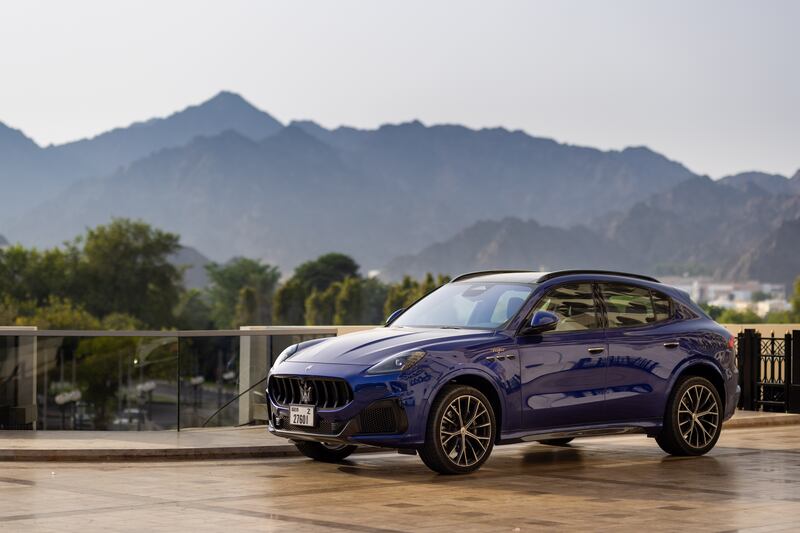 A Maserati with the Hajar mountains in the background. All photos: The Ritz-Carlton