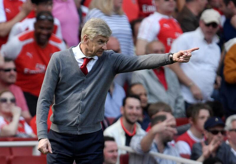 Arsenal manager Arsene Wenger gestures during the match against West Ham on April 22, 2018. Toby Melville / Reuters