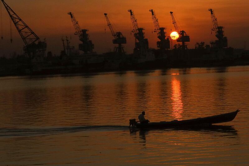 A boat sails as the sun sets over Shatt al-Arab waterway, Basra, Iraq. AP Photo
