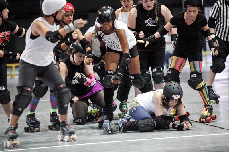 The first inter-league roller derby exhibition bout in the region was fought at the Du Forum on Yas Island on Friday. In the match-up between Dubai Roller Derby, in white, and Abu Dhabi, staying upright was only half the battle. Antonie Robertson / The National