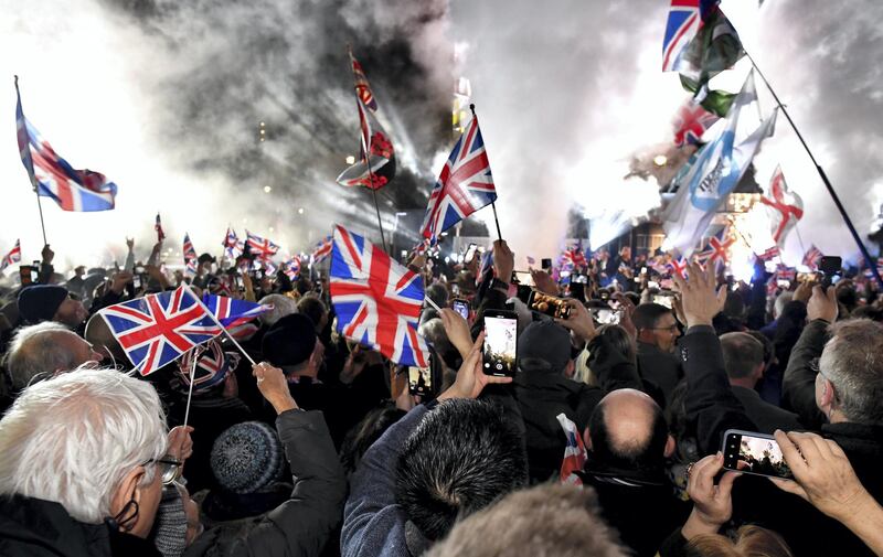 LONDON, ENGLAND - JANUARY 31: Pro Brexit supporters celebrates as the United Kingdom exits the EU during the Brexit Day Celebration Party hosted by Leave Means Leave at Parliament Square on January 31, 2020 in London, England. At 11.00pm on Friday 31st January the UK and Northern Ireland exits the European Union, 188 weeks after the referendum on June 23rd, 2016. (Photo by Jeff J Mitchell/Getty Images)