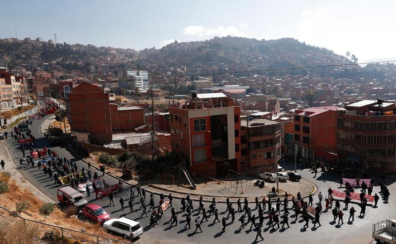People protest against the government's response to the pandemic in La Paz, Bolivia. AP Photo