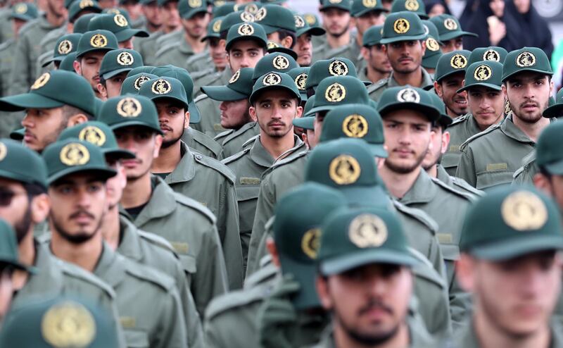 epa07367776 (FILE) - Members of Iranian revolutionary guards corps (IRGC) shout slogans during a ceremony marking the 40th anniversary of the 1979 Islamic revolution, at the Azadi (Freedom) square in Tehran, Iran, 11 February 2019 (Reissued 13 February 2019). According to IRGC official website (Sepahnews), a bombing that targeted a bus carrying members of Iran's Revolutionary Guard in the country's far southeast has killed at least 27 and injured 13.  EPA/ABEDIN TAHERKENAREH