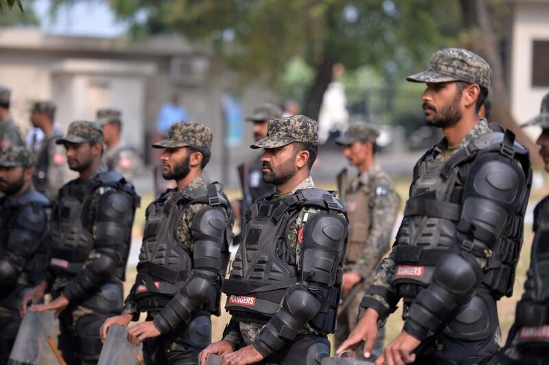 Pakistani paramilitary soldiers stand guard outside the Supreme Court. AFP