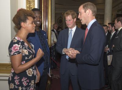 Jamal Edwards, second left, and DJ Gemma Cairney meet with Prince William and Prince Harry at Buckingham Palace in London during the launch of the Queen's Young Leaders Programme on September 7, 2014. 